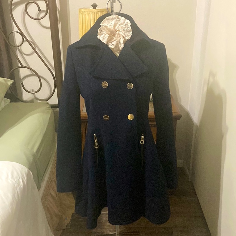 Double breasted peplum coat